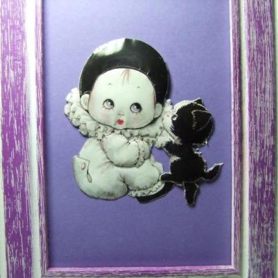 Le Pierrot assis et le chaton